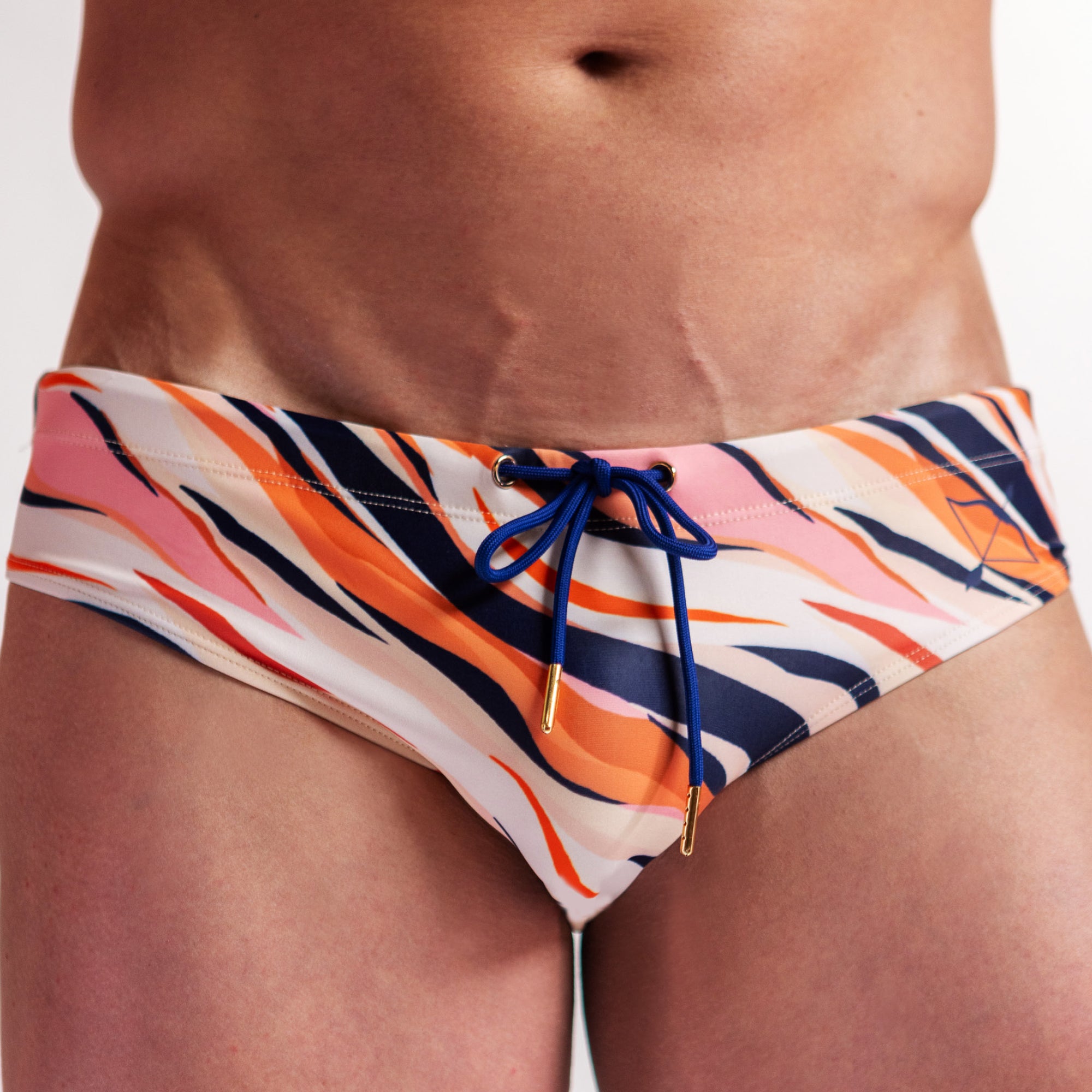 Men's Swimwear brief in pink tiger print close up