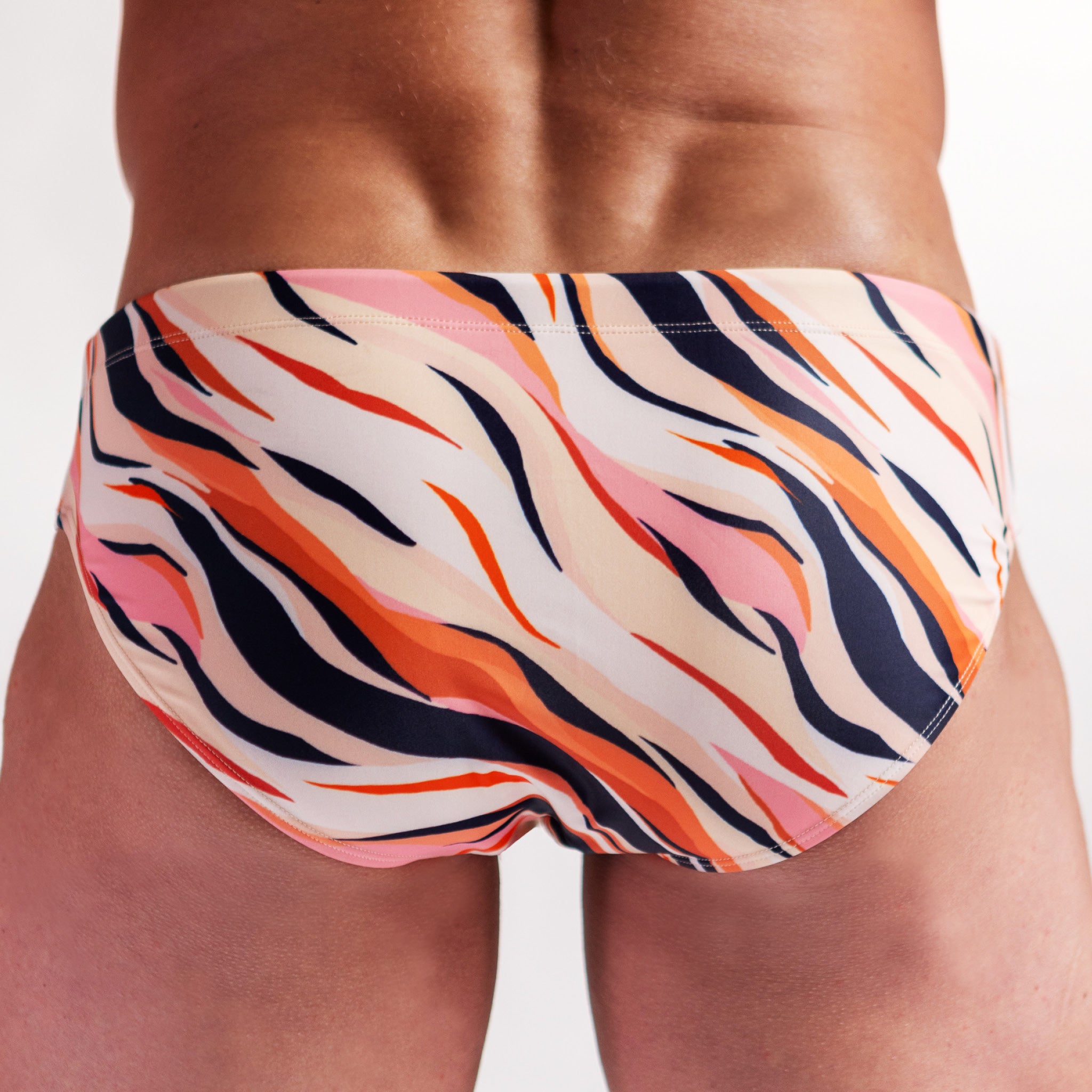 Men's Swimwear brief in pink tiger print back close up