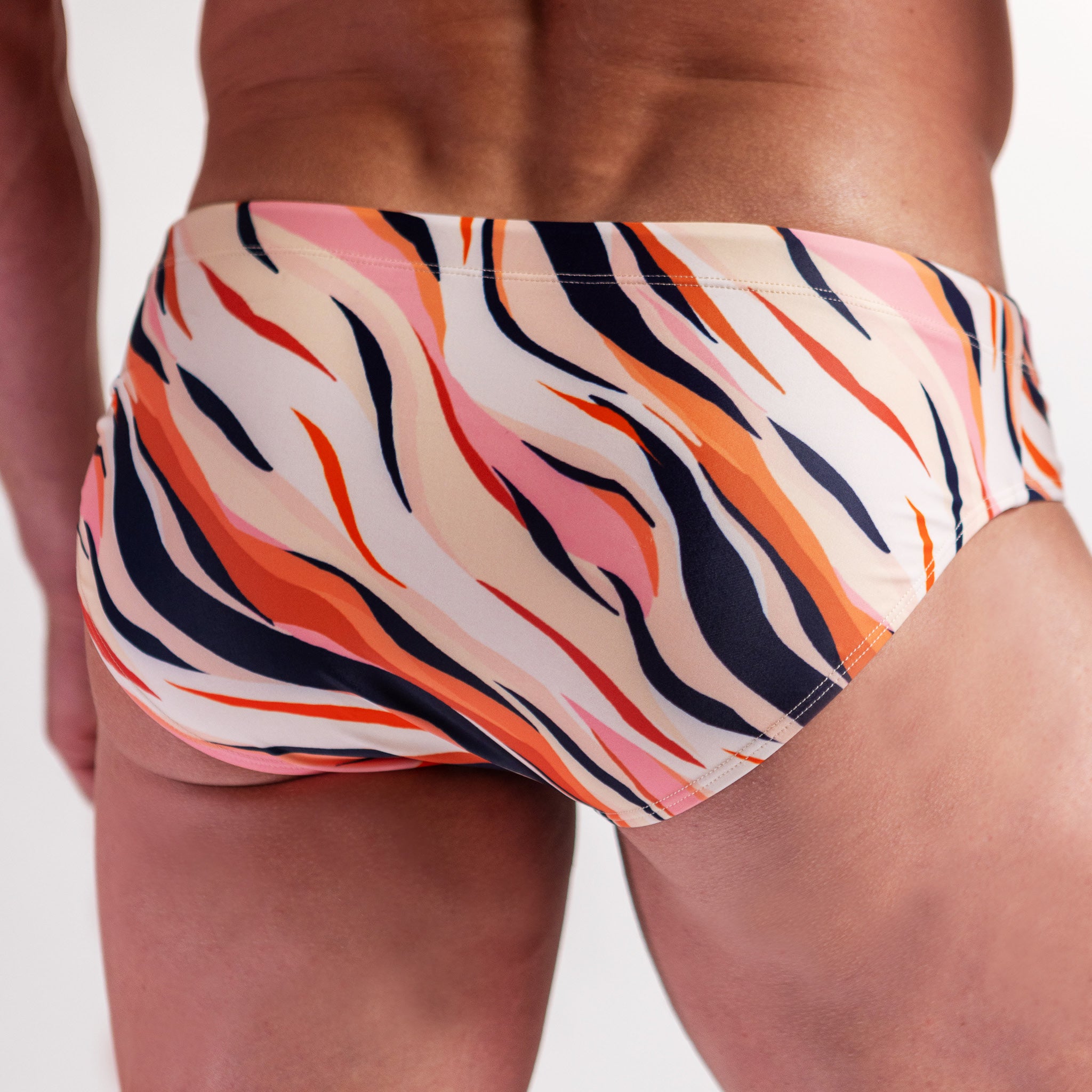 Men's Swimwear brief in pink tiger print back shot
