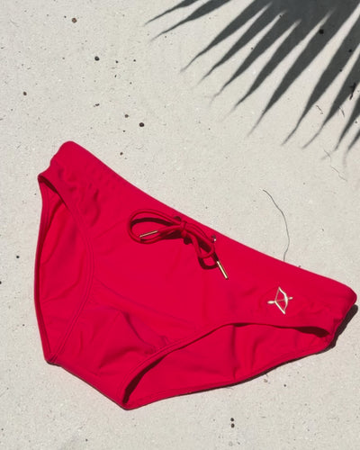 Video of the Apollo Swim Brief in Chilli Red worn on the beach