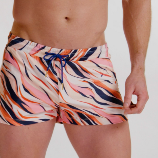 Model showcasing the tiger brief swim short