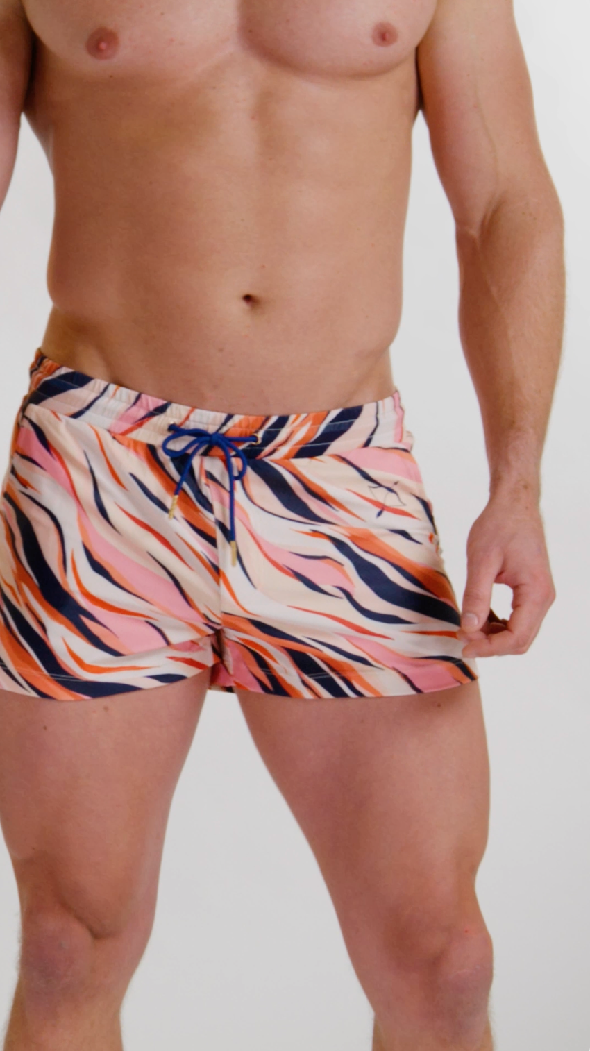 Model showcasing the tiger brief swim short